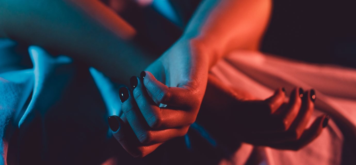 Swingers Club - Close up on female young woman's girl's beautiful hands with bla