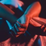 Swingers Club - Close up on female young woman's girl's beautiful hands with bla