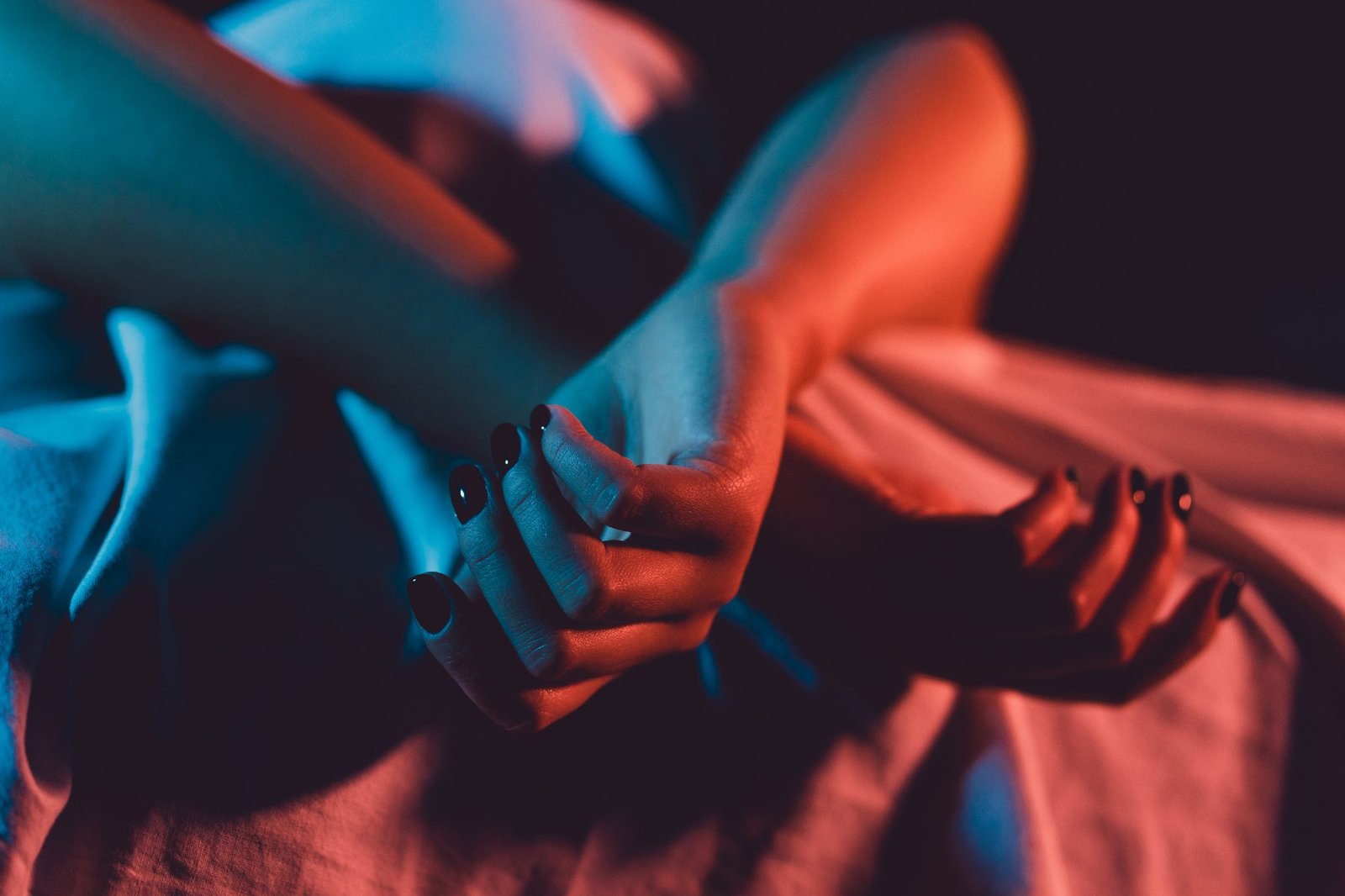 Swingers Club - Close up on female young woman's girl's beautiful hands with bla