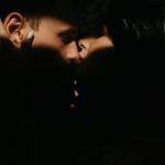 Swingers Club - bride and groom illuminated by light